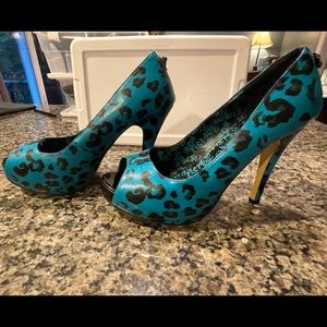 Ironfist size 9 1/2 cheetah print pumps - Open toe